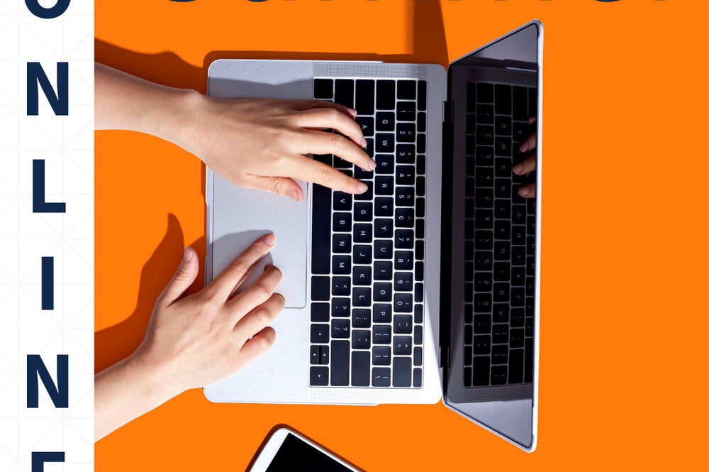 A closeup of hands typing on a laptop promoting summer online courses.