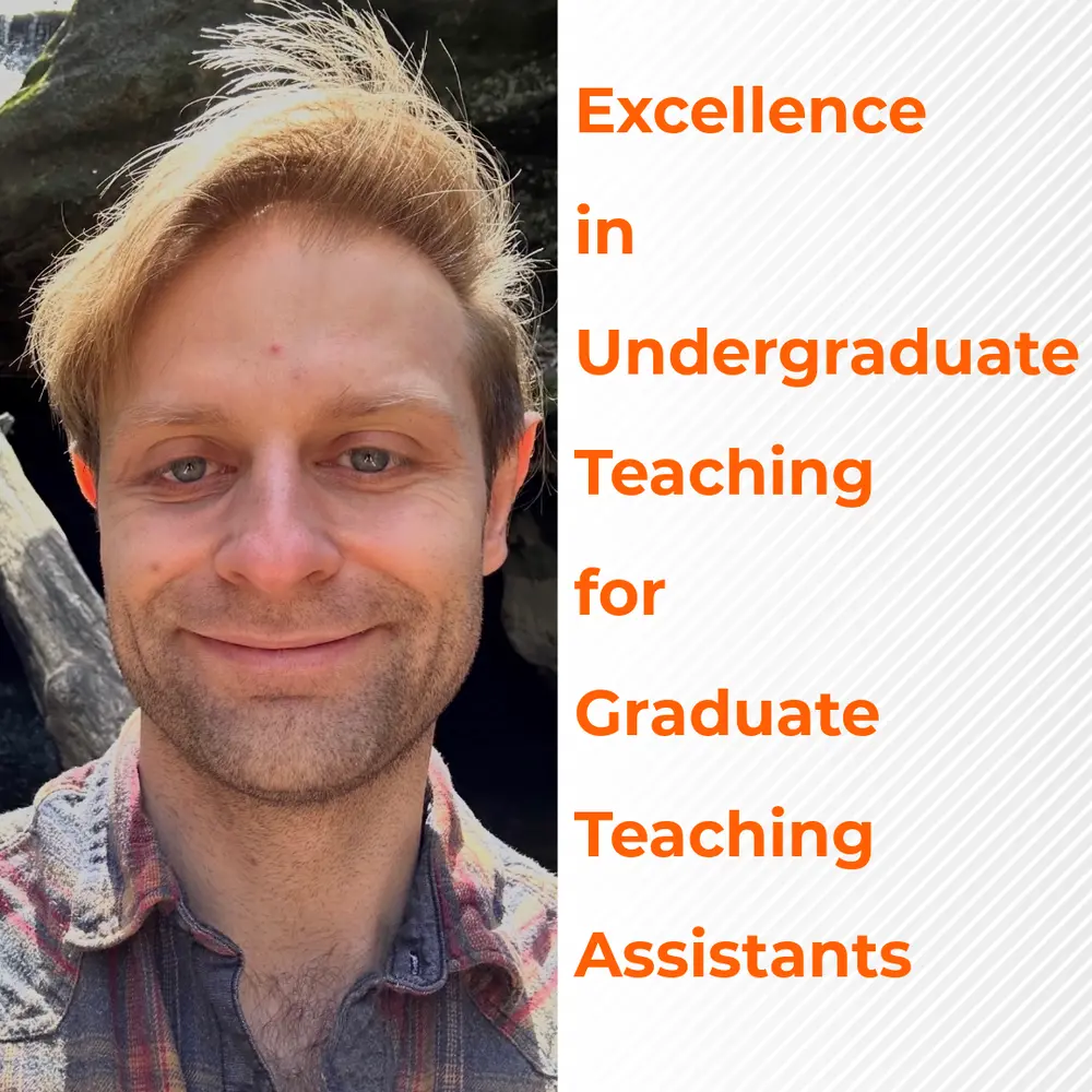 Corey Richier smiling in the sun wearing a plaid flannel shirt