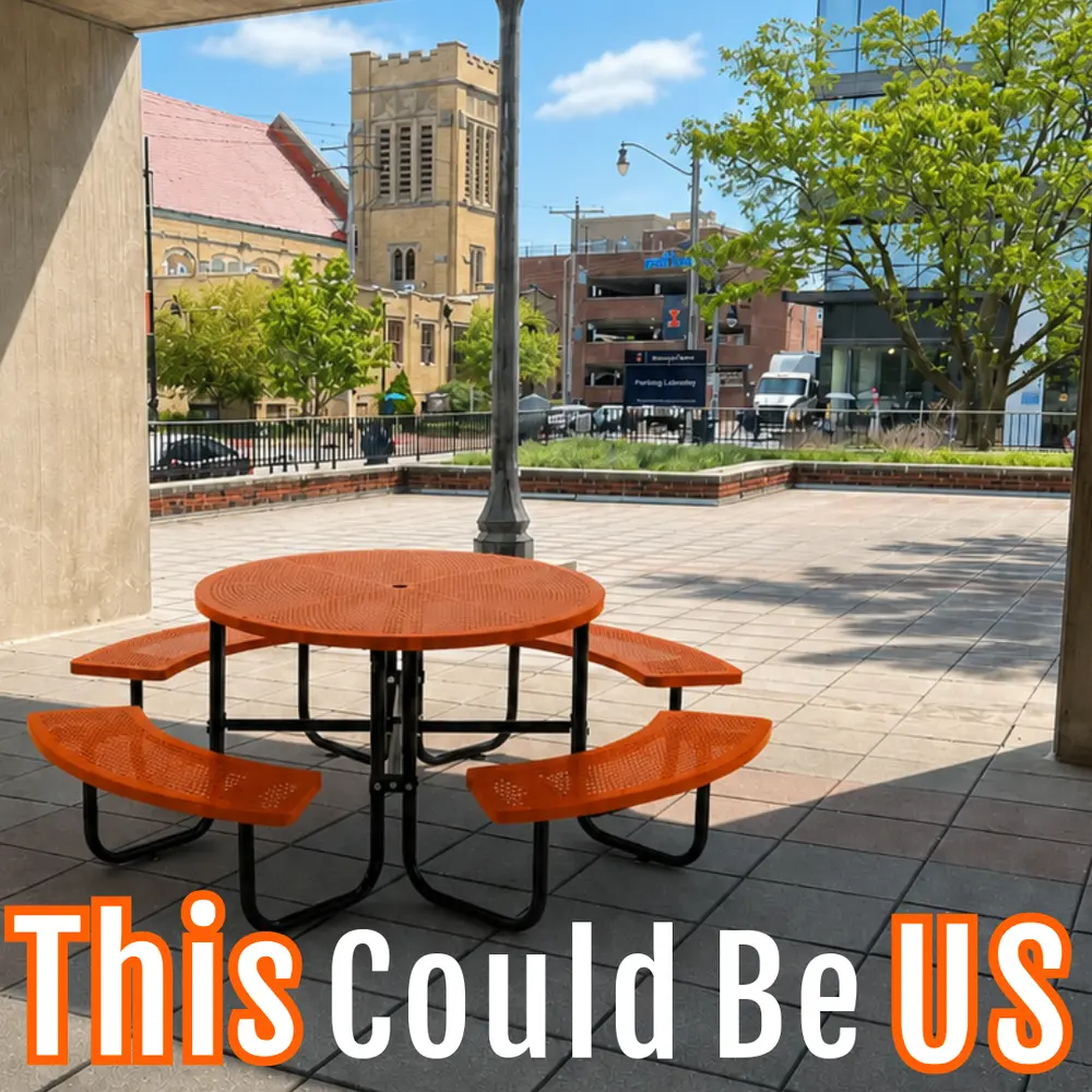 An orange picnic type table outside of the psychology building
