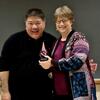Loren Kuzuhara accepts the award from Wendy Heller, Professor & Head, Department of Psychology