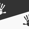Imprint of hand in white on black background and black hand on white background